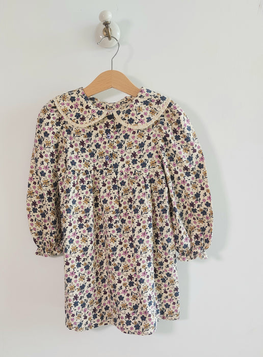 ZARA Floral dress with a round collar