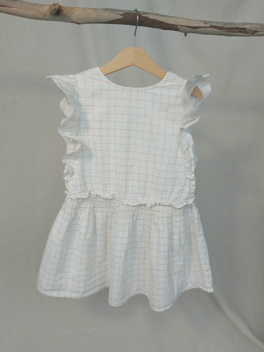 LOUIS LOUISE Girls’ white dress with ruffle details
