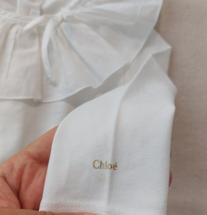 Baby Girl Outfit – TARTINE ET CHOCOLAT Ruffle-Detail Romper & CHLOÉ Long-Sleeved Bodysuit with Ruffled Collar