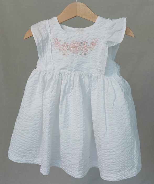 DPAM Baby girls’ textured white embroidered dress