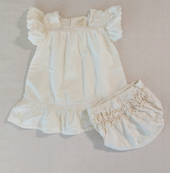 NATURA PURA Baby dress with lace inserts and ruffled bloomers